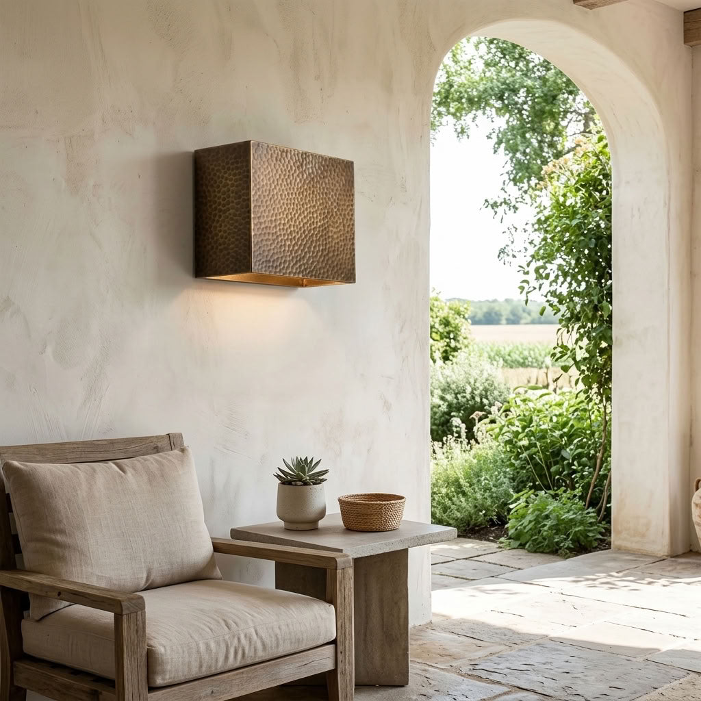 Hammered brass square wall sconce with soft indirect ambient lighting — view 2