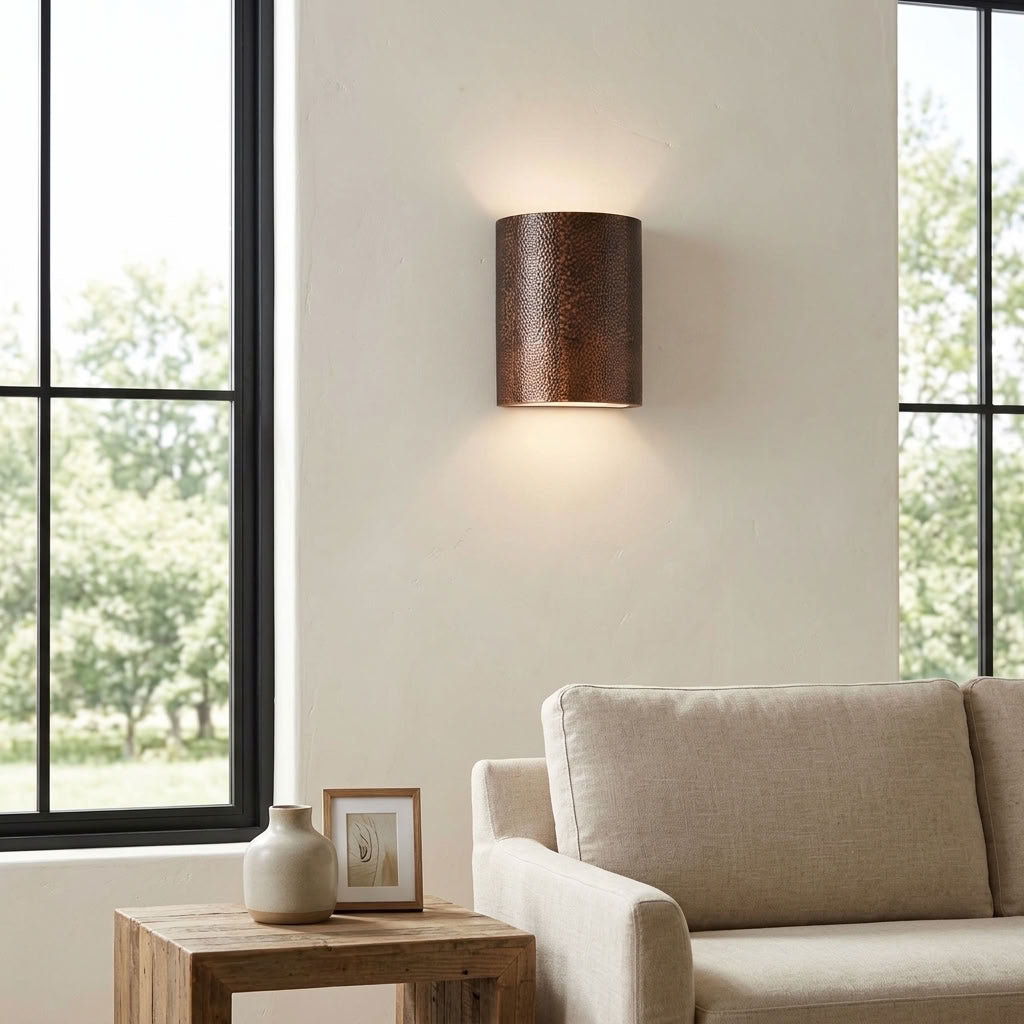 Hammered copper cylinder wall sconce with warm up and down lighting — view 2