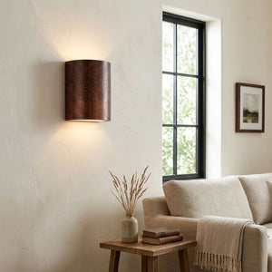 Hammered copper cylinder wall sconce with warm up and down lighting — view 5