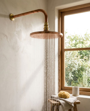Round Hammered Rain Shower Head with Wall-Mount Arm, copper finish, view 1